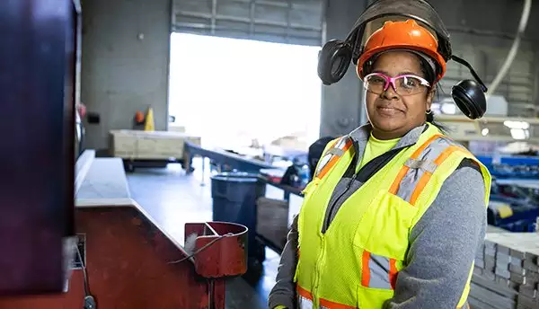 BFS Worker Operating Machinery